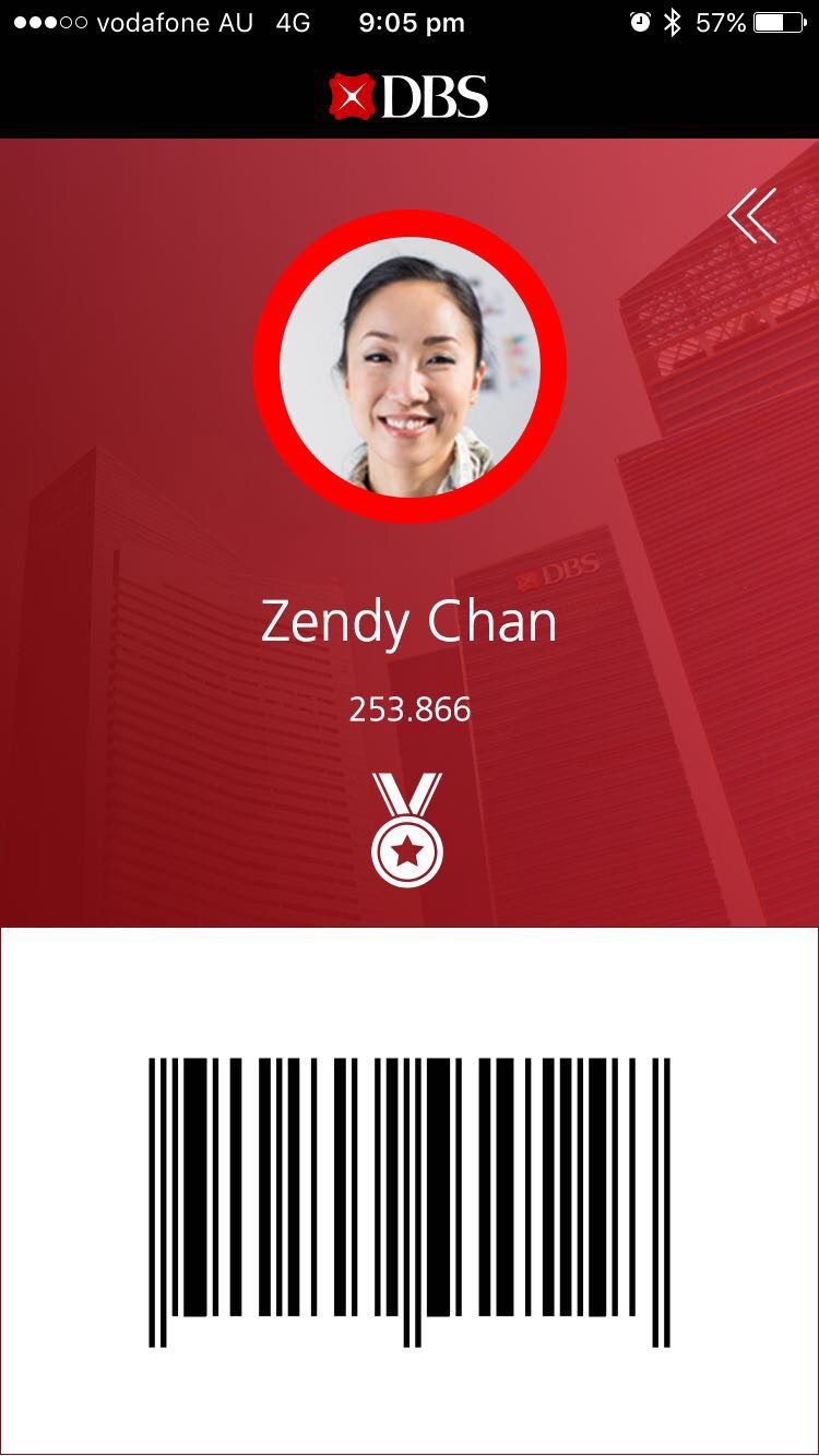 DBS employee app profile screen with the staff photo, ID number and access barcode