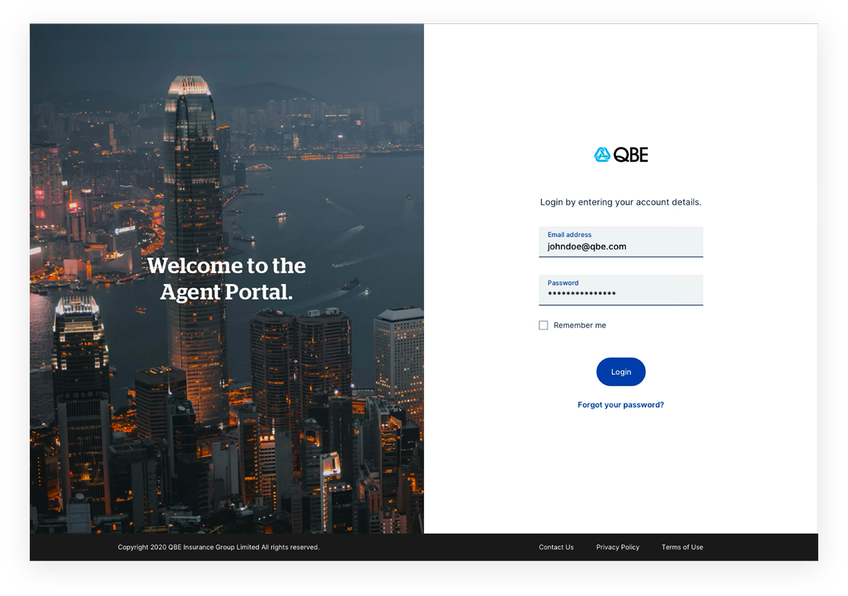 QBE Agent Portal sign-in page over a night skyline photograph